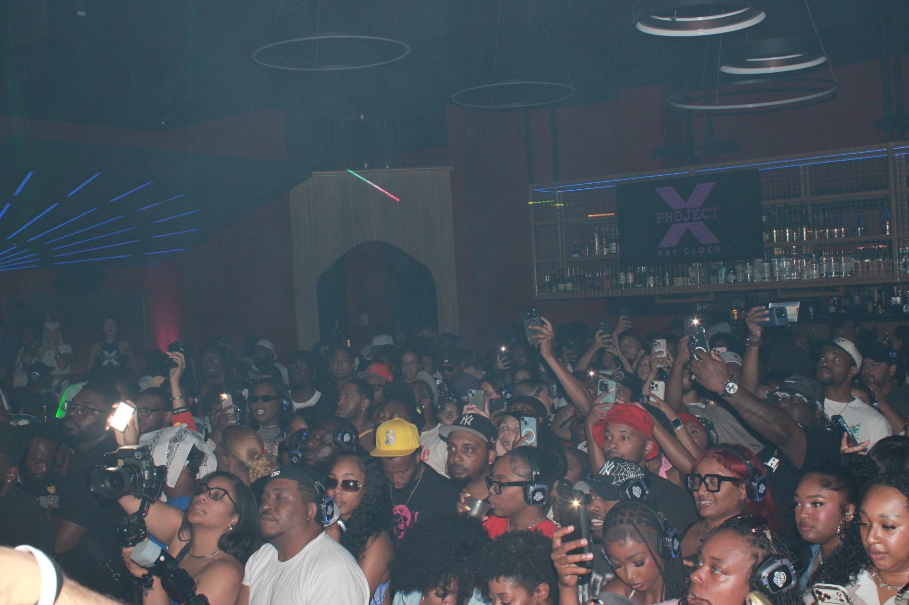 A packed crowd engaged during a live experience